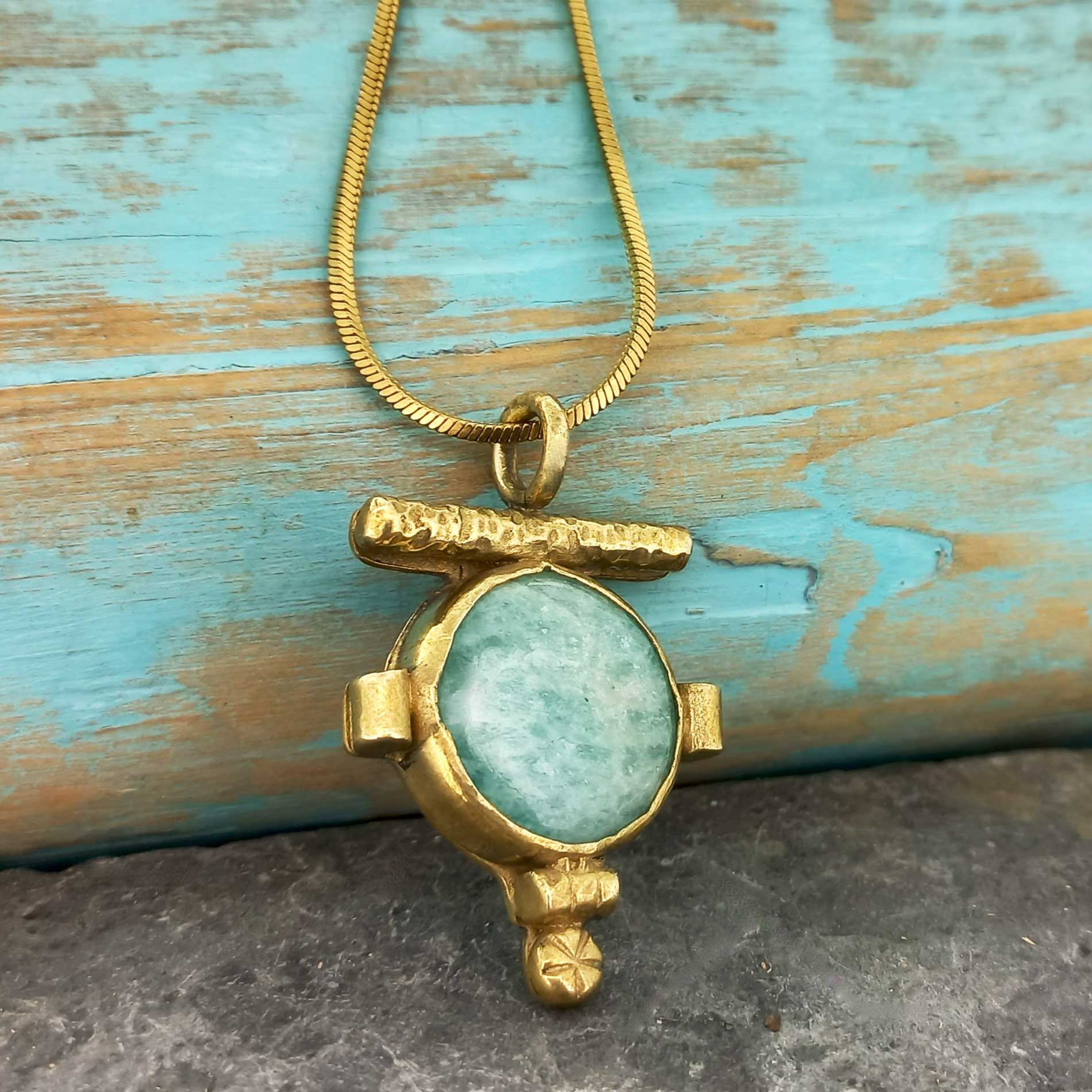 Unusual Amazonite brass pendant with hand-worked details