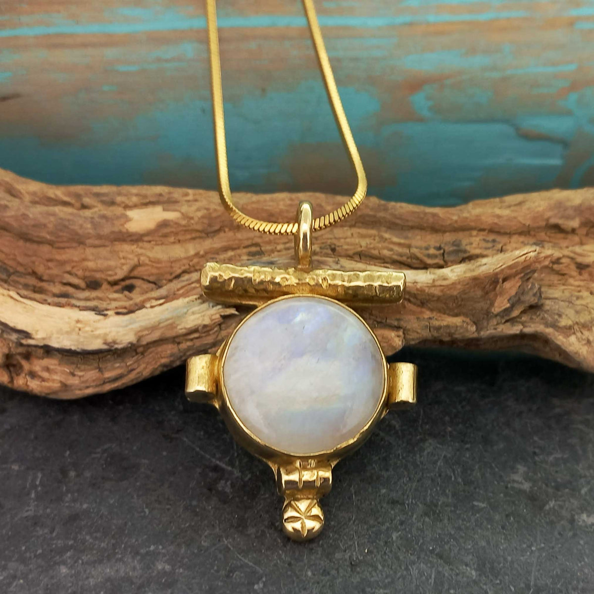 Unusual handmade gold coloured brass pendant with Moonstone
