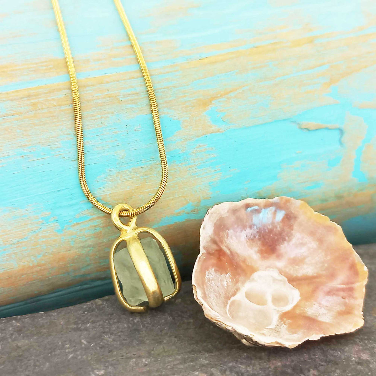 Fluorite Claw Brass Necklace with pink shell
