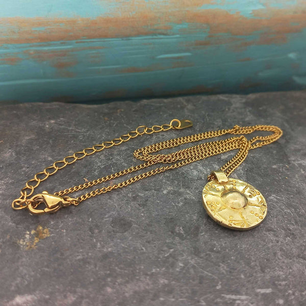 Handcrafted Moneta brass necklace with gold-plated chain