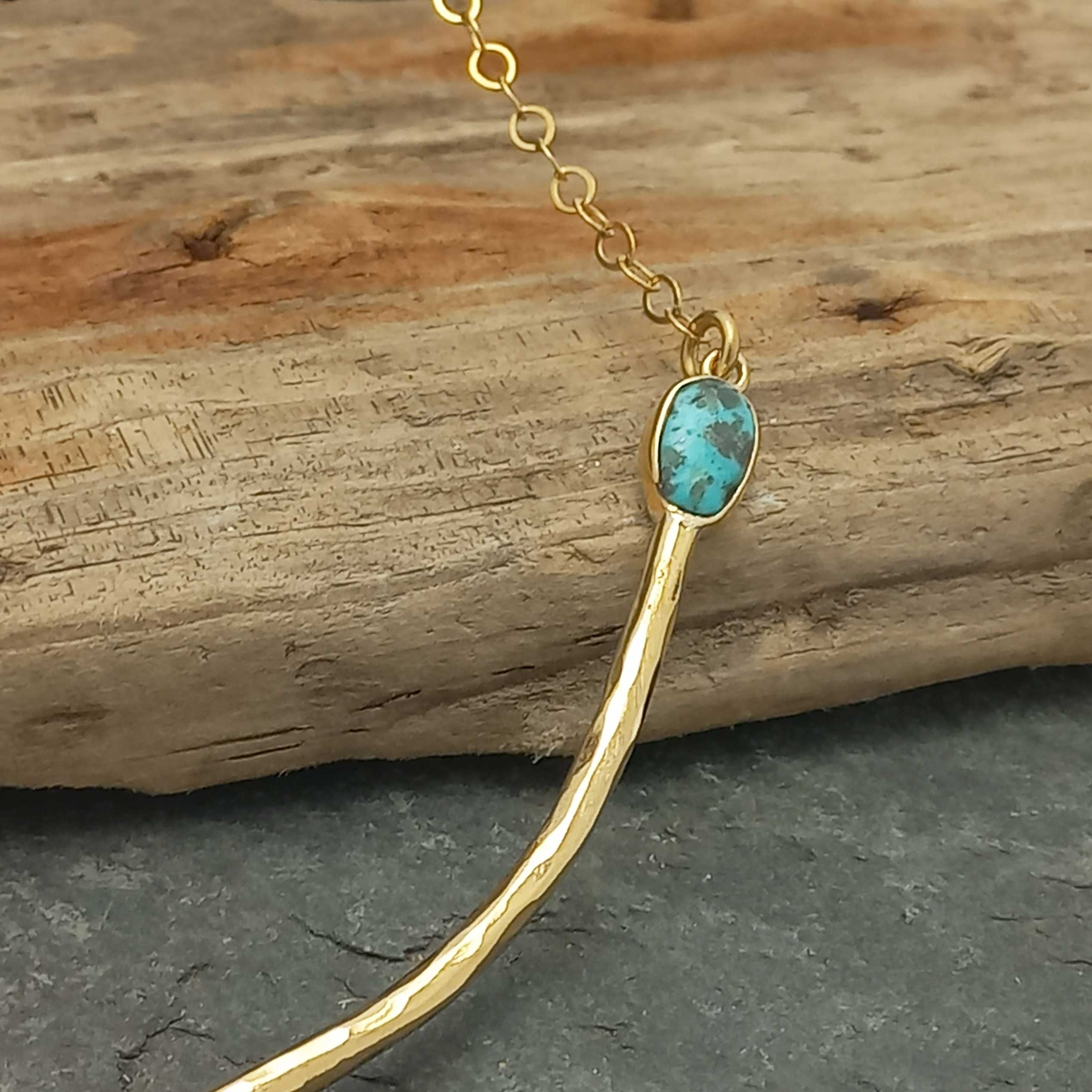 Turquoise stone detail on brass necklace
