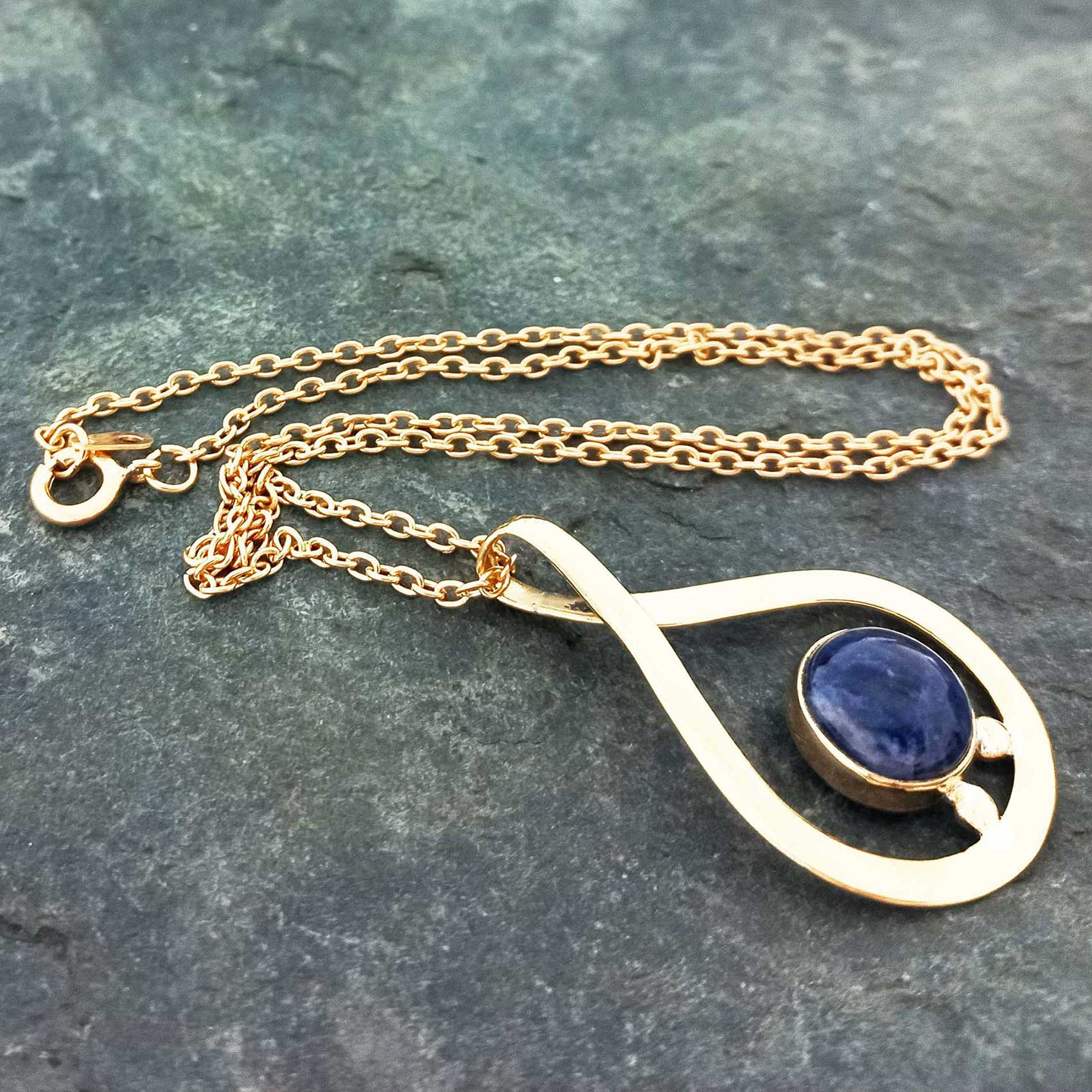 Brass teardrop pendant with gold-plated chain & Sodalite stone