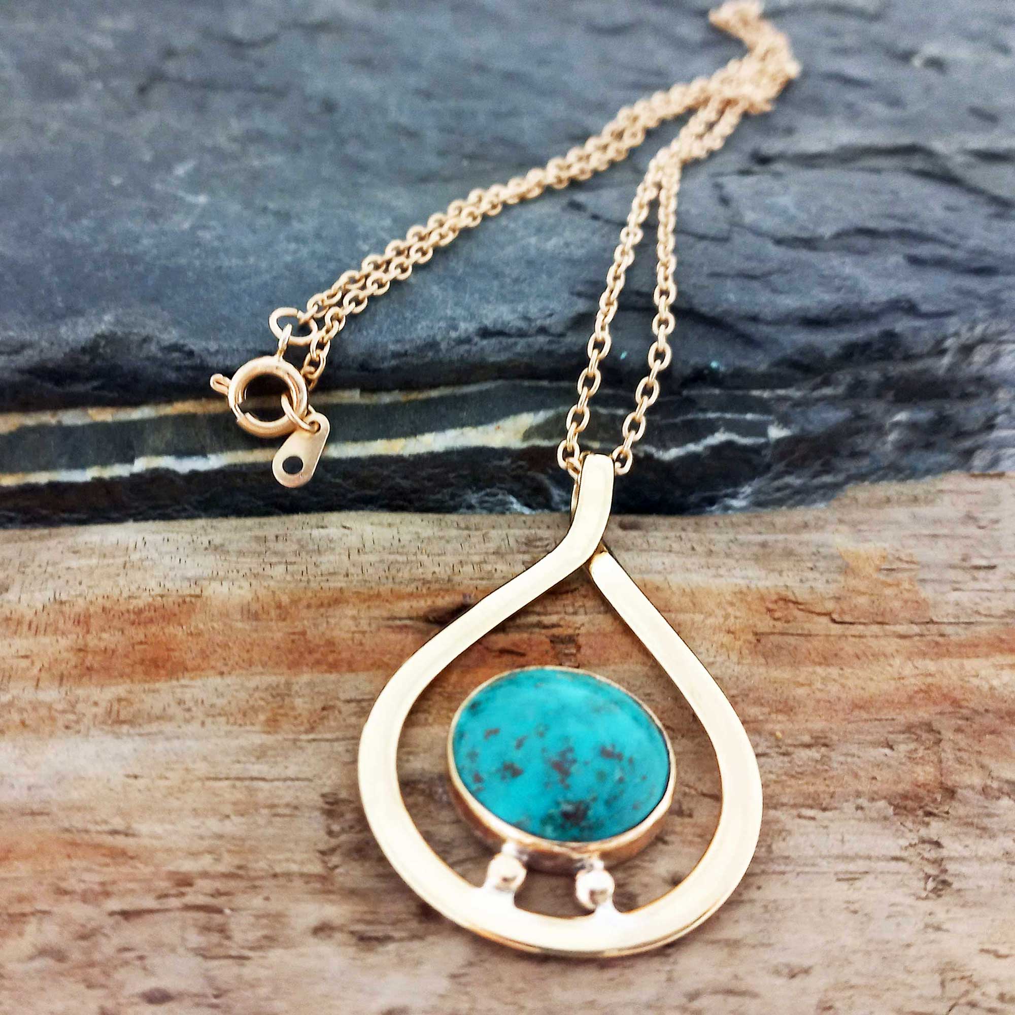 Turquoise stone with brass teardrop neicklace
