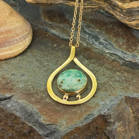 Brass teardrop pendant necklace with a green marbled Chrysocolla stone