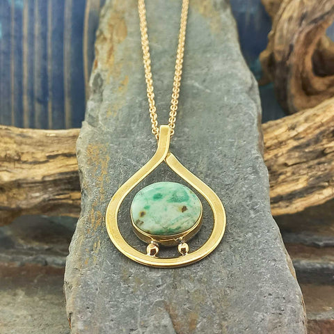 Unusual gold brass Chrysocolla teardrop pendant necklace with a turquoise 