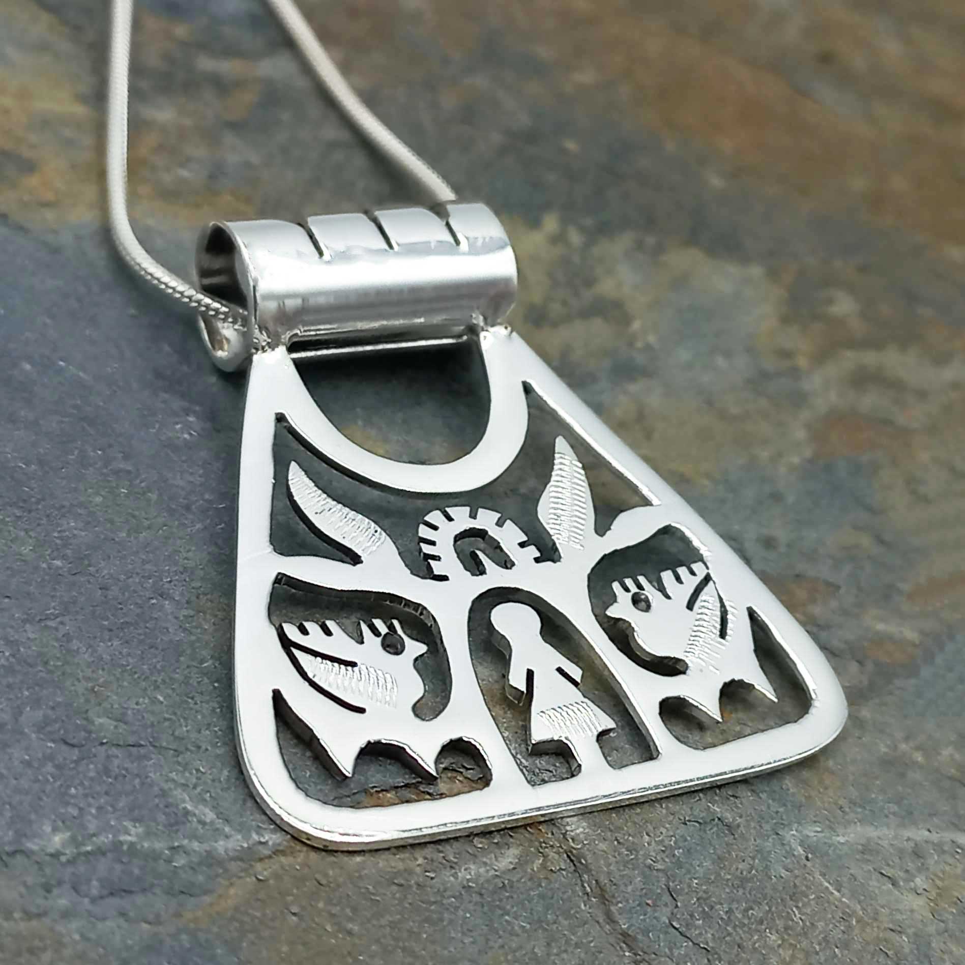 Triangle handmade pendant with tree, female and birds