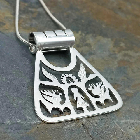 Triangle handmade pendant with tree, female and birds