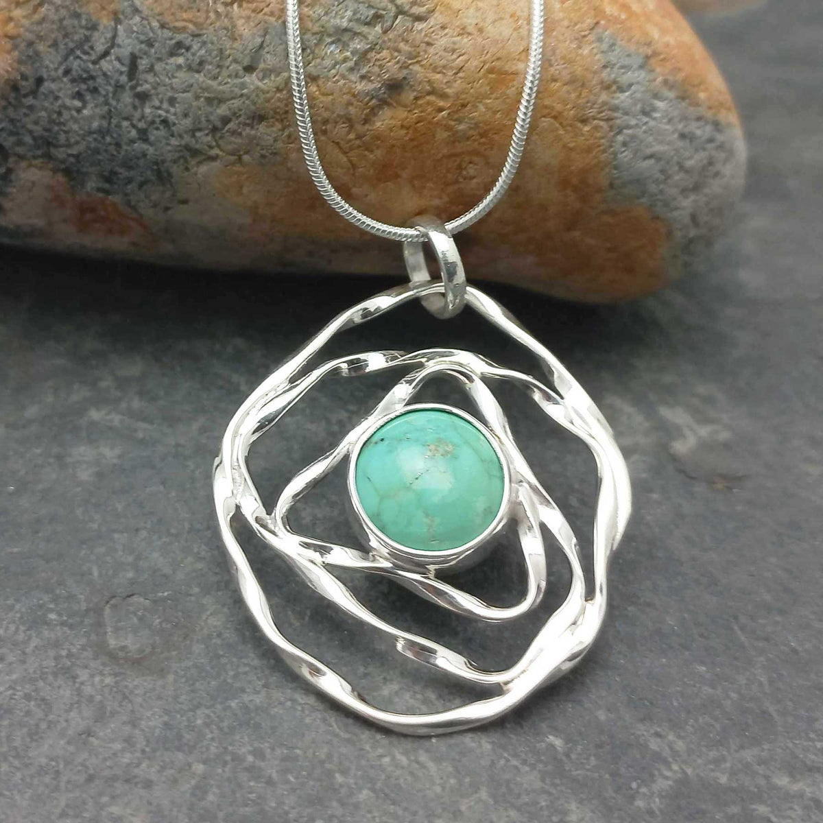 Unusual silver web pendant with Turquoise stone Main image