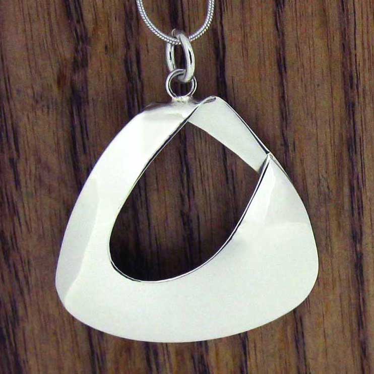 Handmade silver polished abstract pendant