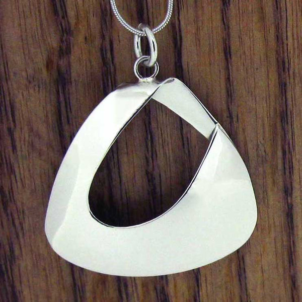 Handmade silver polished abstract pendant