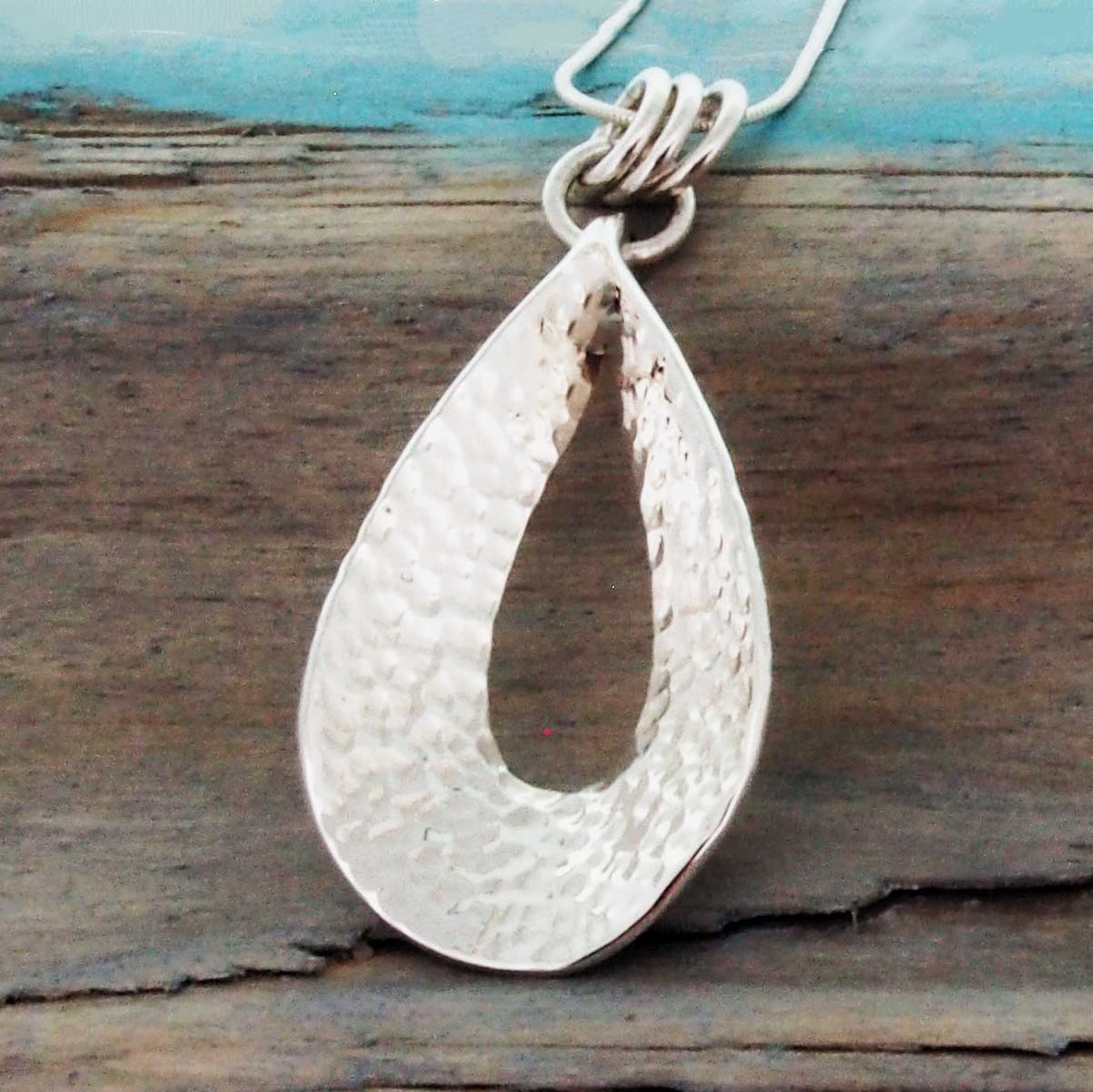 Handmade hammered statement pendant Main image