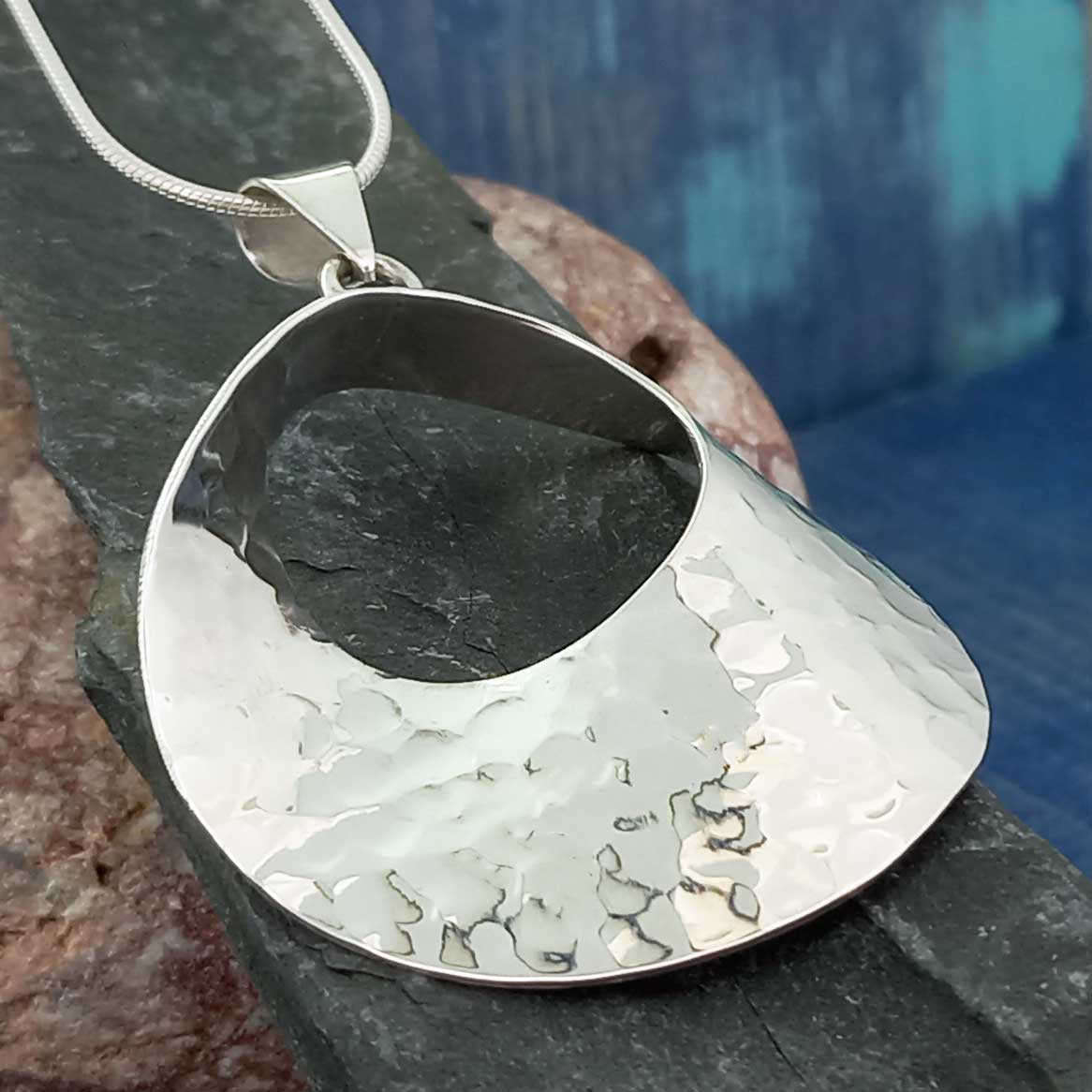Sterling silver hammered statement pendant