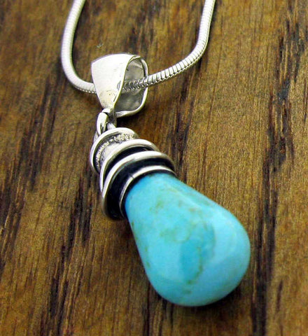 Turquoise Mexican silver pendant