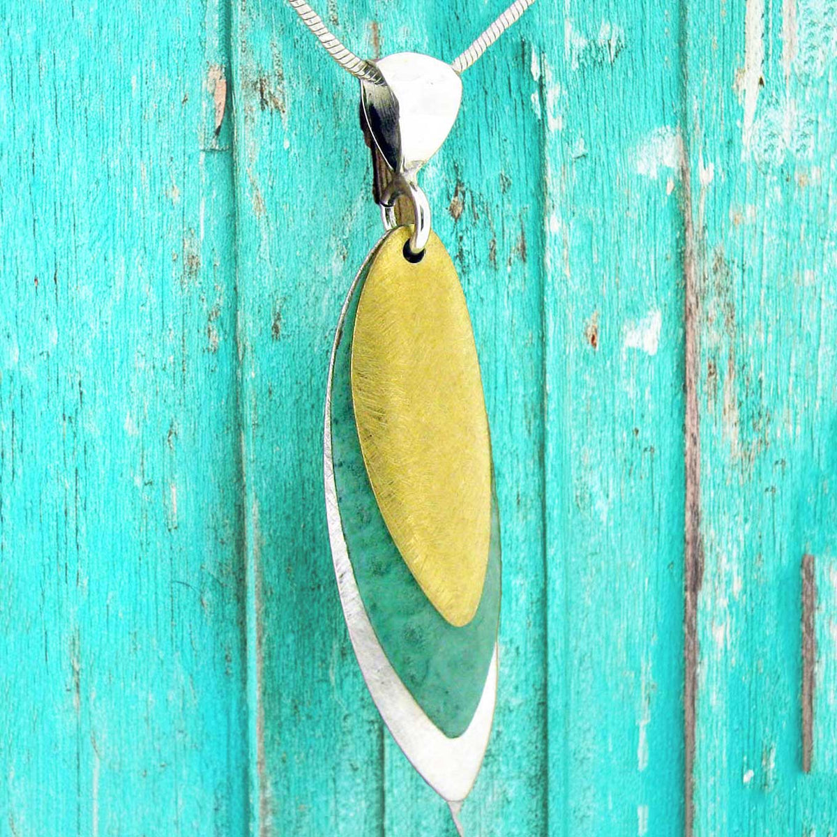 3 layered unusual patina silver pendant