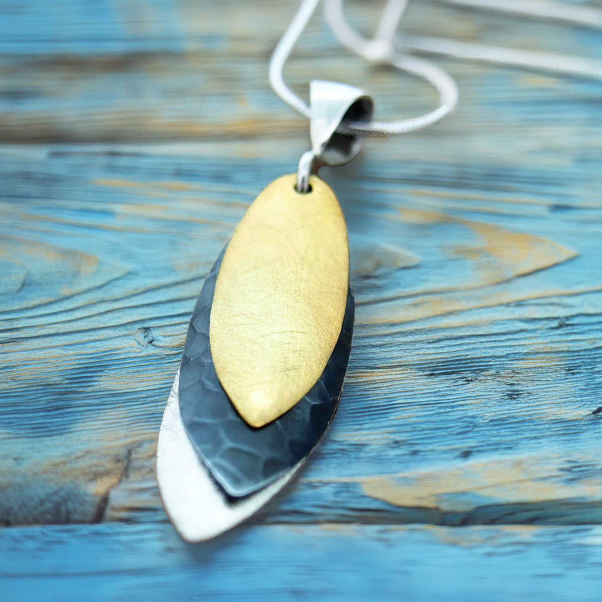3 leaves gold leaf silver unusual earrings Main image