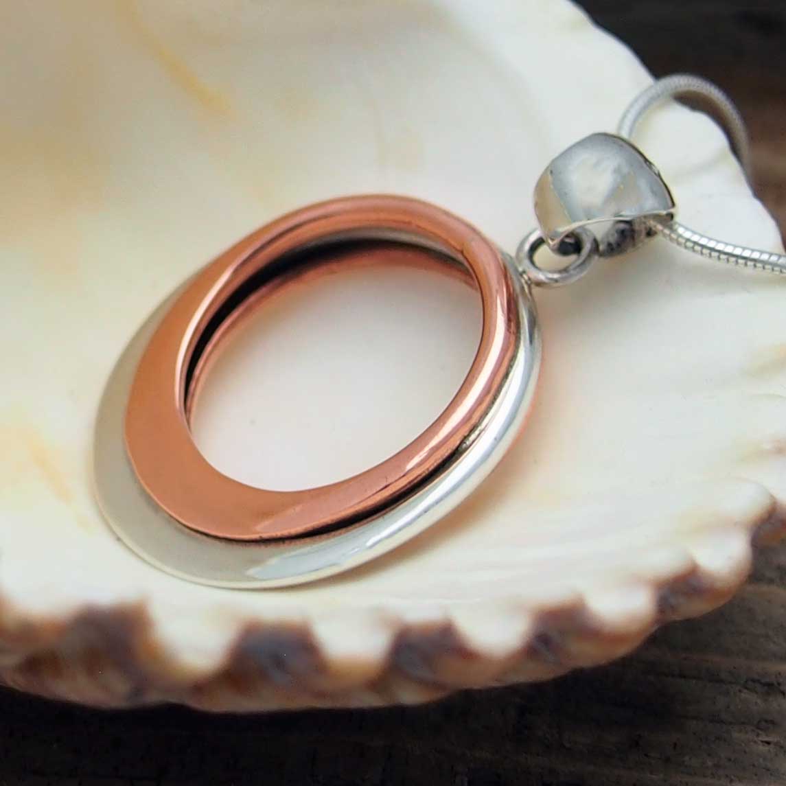 Unusual silver copper pendant