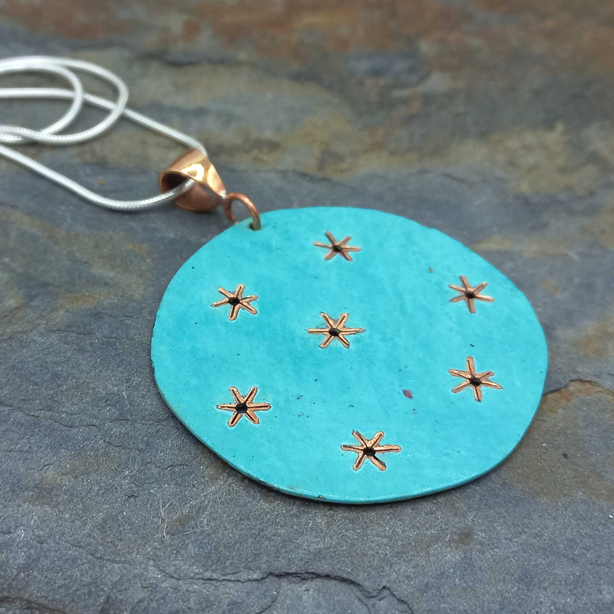 Unusual Silver Pendant with stars