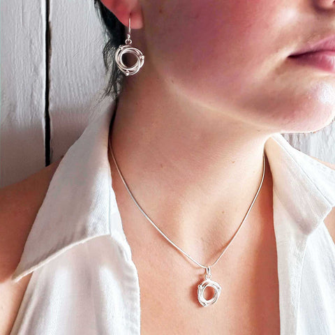 Entwined sterling silver pendant and drop earrings