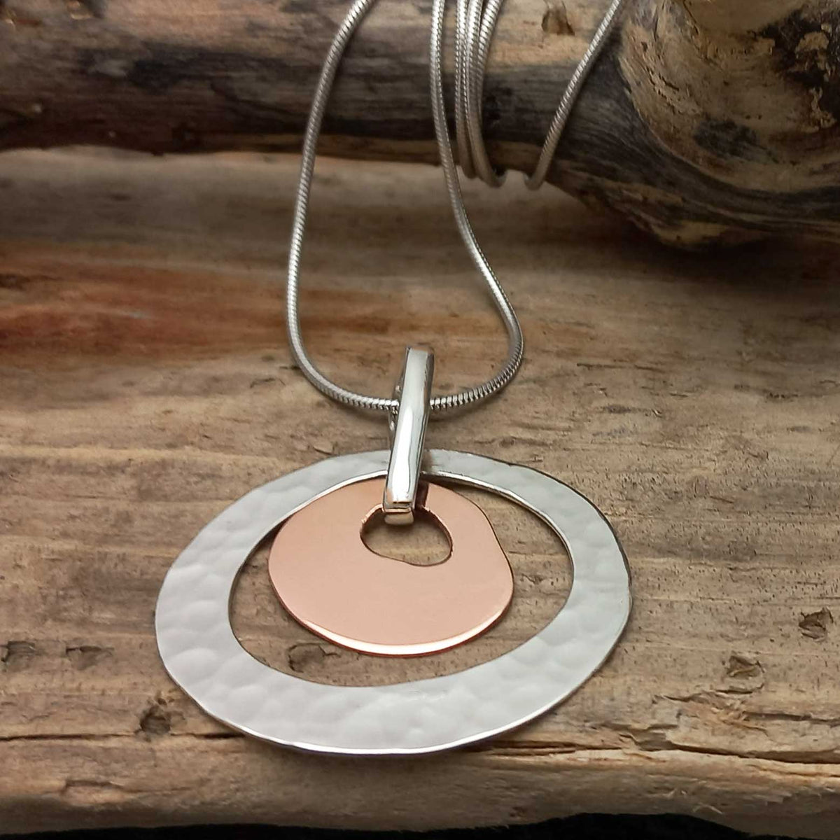 Unusual ammered silver pendant with copper  Main image