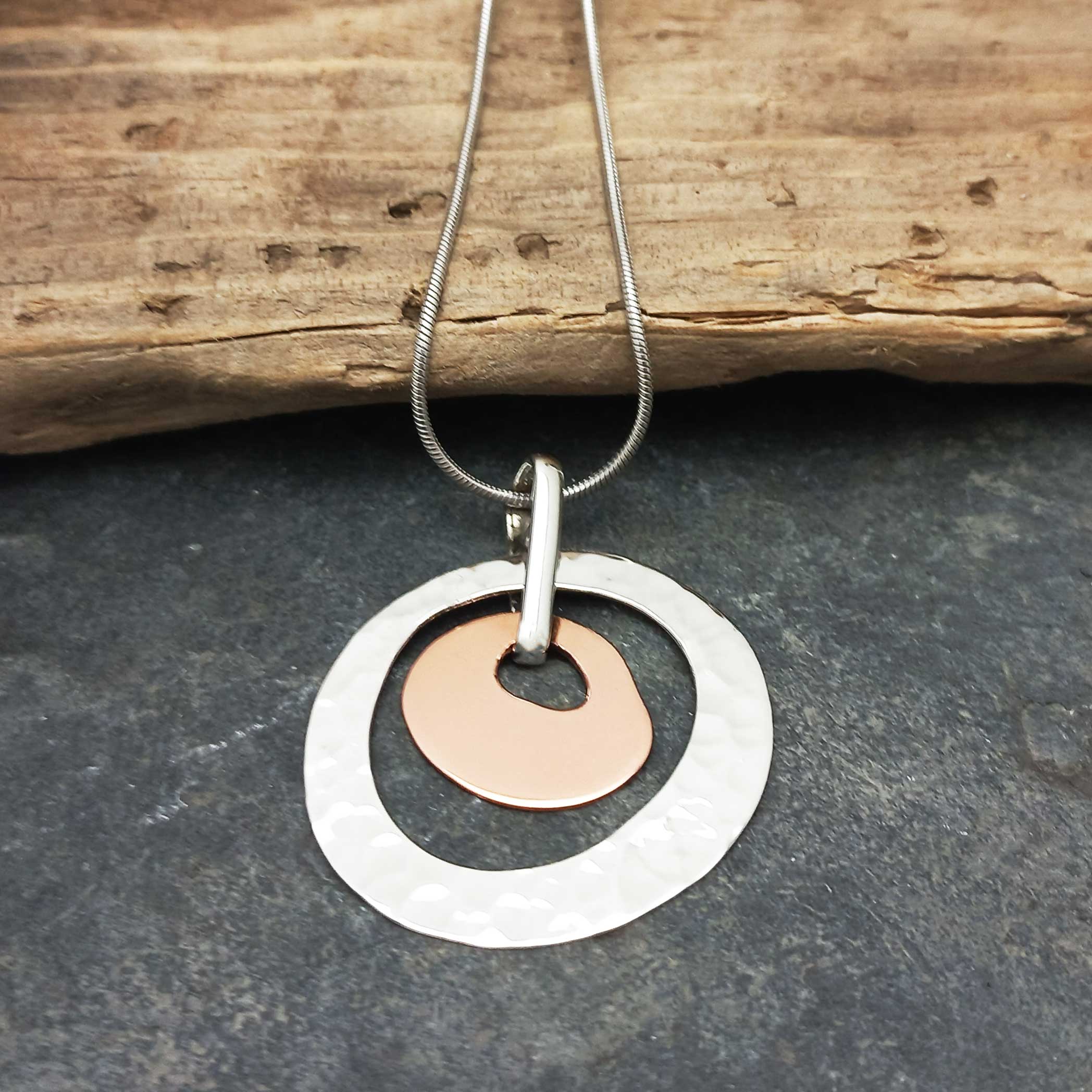 Handmade unusual oval sterling silver copper necklace