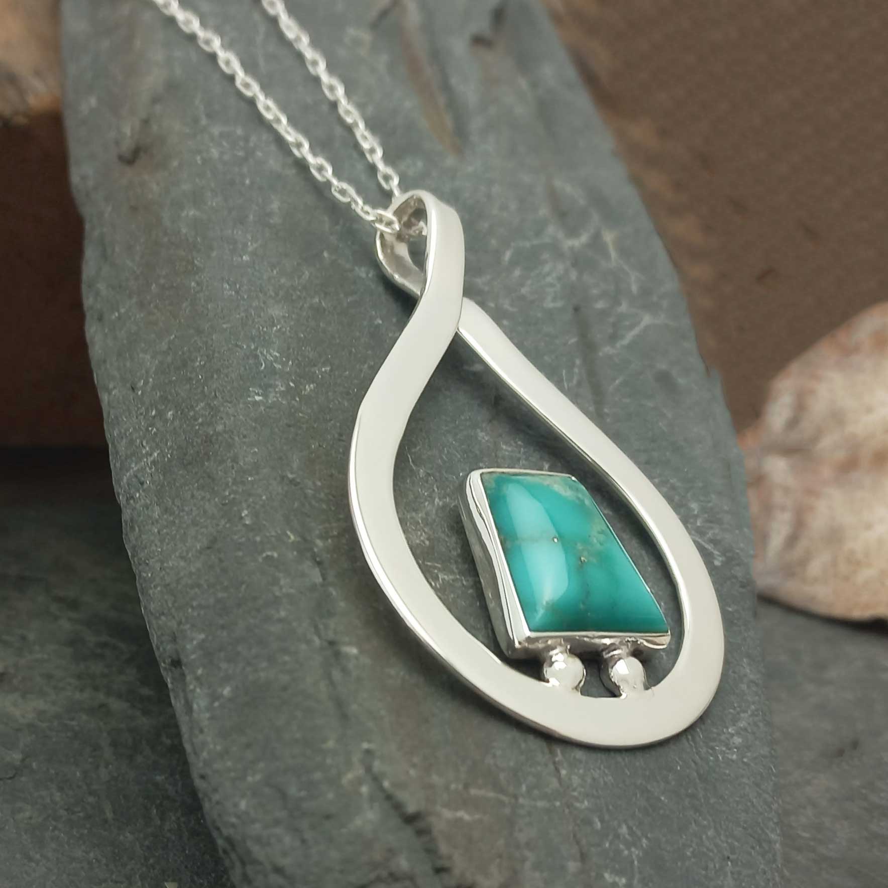 Unusual sterling silver turquoise pendant