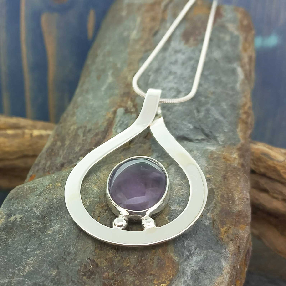 Handmade artisan silver teardrop pendant with Amethyst stone