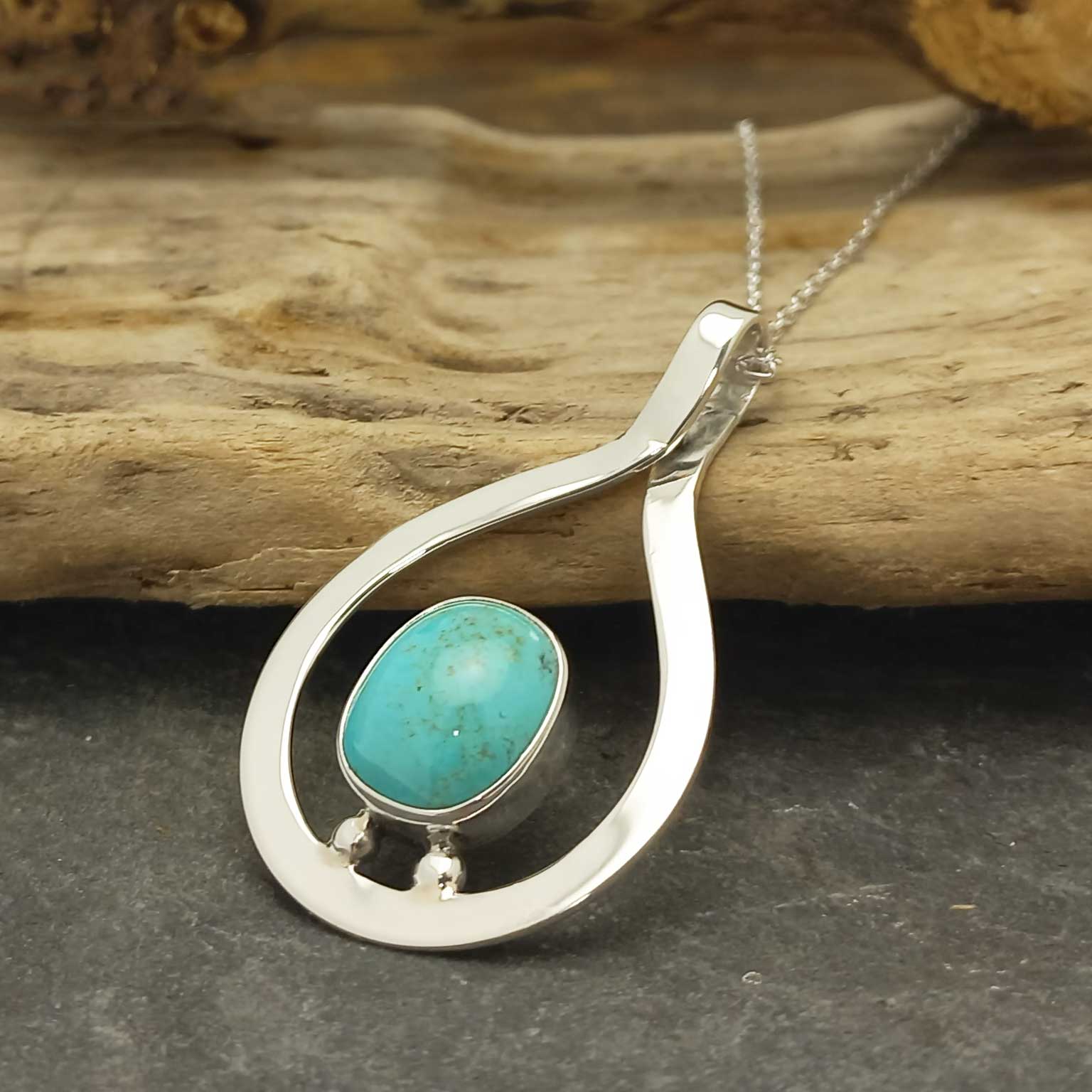 Turquoise stone sterling silver pendant