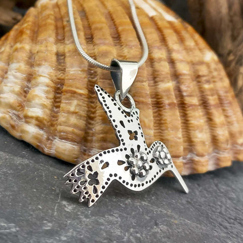 Handmade silver folk art Mexican hummingbird pendant