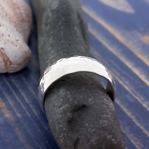 Close-up of a hammered handmade silver ring.