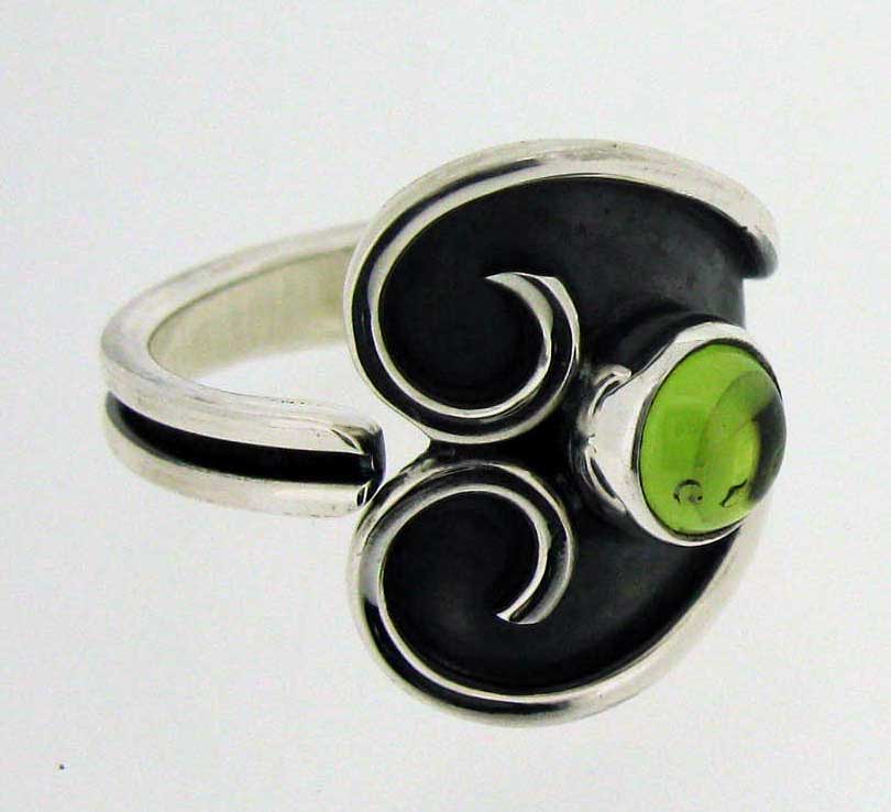 Unusual handmade silver ring peridot