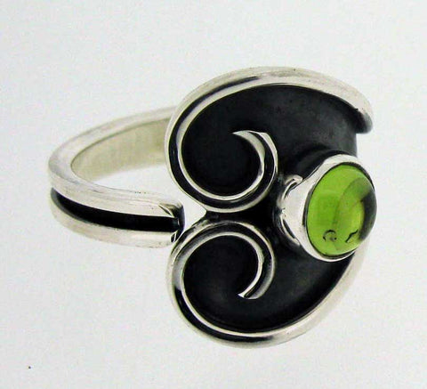 Unusual handmade silver ring peridot