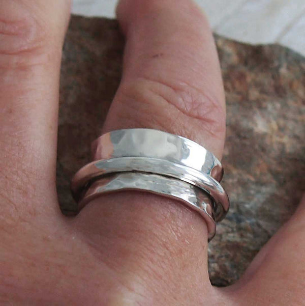 Chunky hammered silver band ring with strand