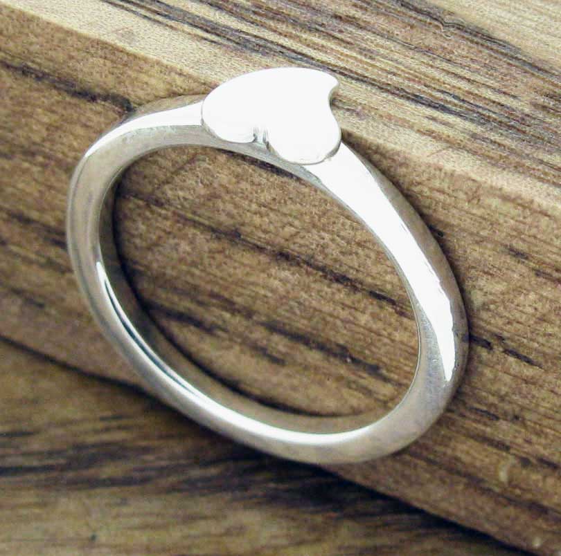Silver band with heart ring
