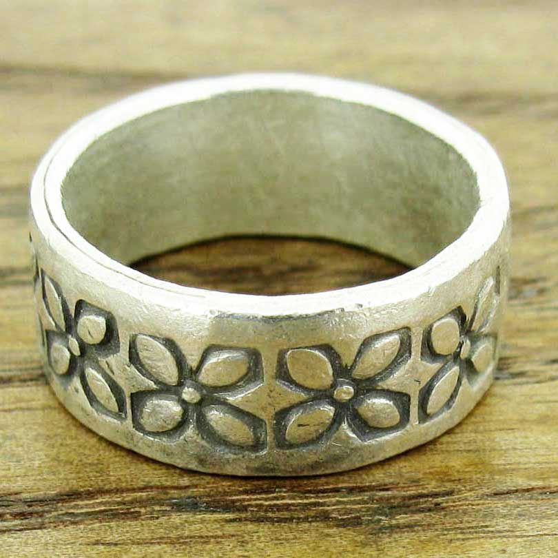 Textured silver flower ring
