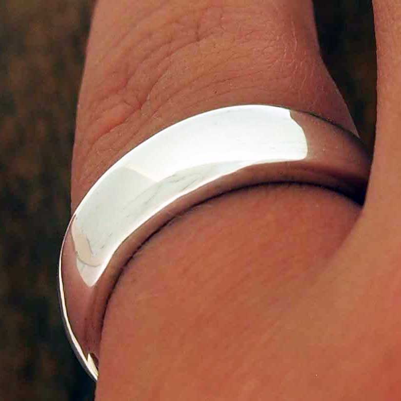 Handmade polished silver band