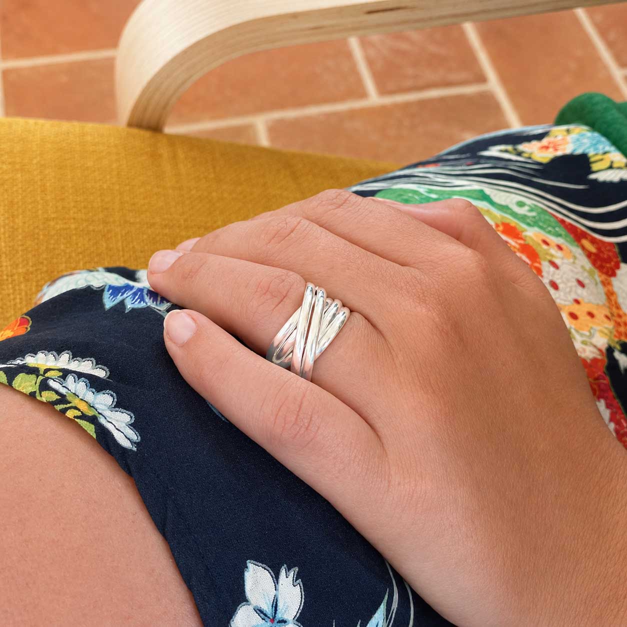 Chunky Sterling silver ring with polished strands, handcrafted.