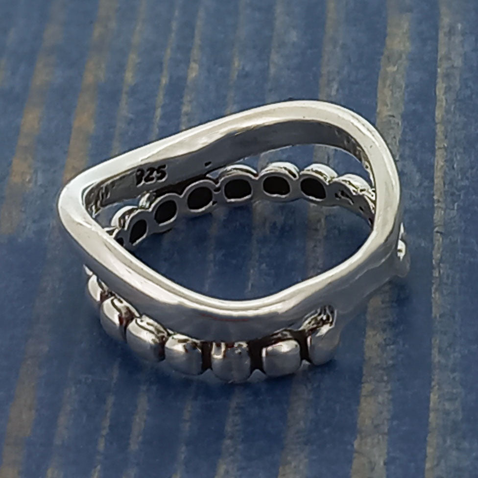 Unusual silver ring with beads