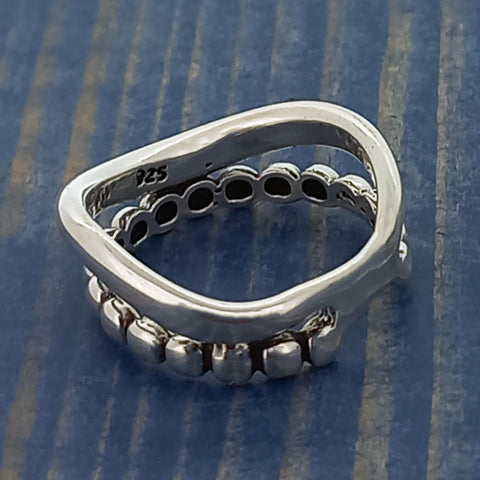 Unusual silver ring with beads