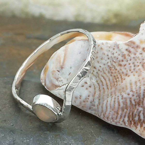 Handmade textured silver ring with opal