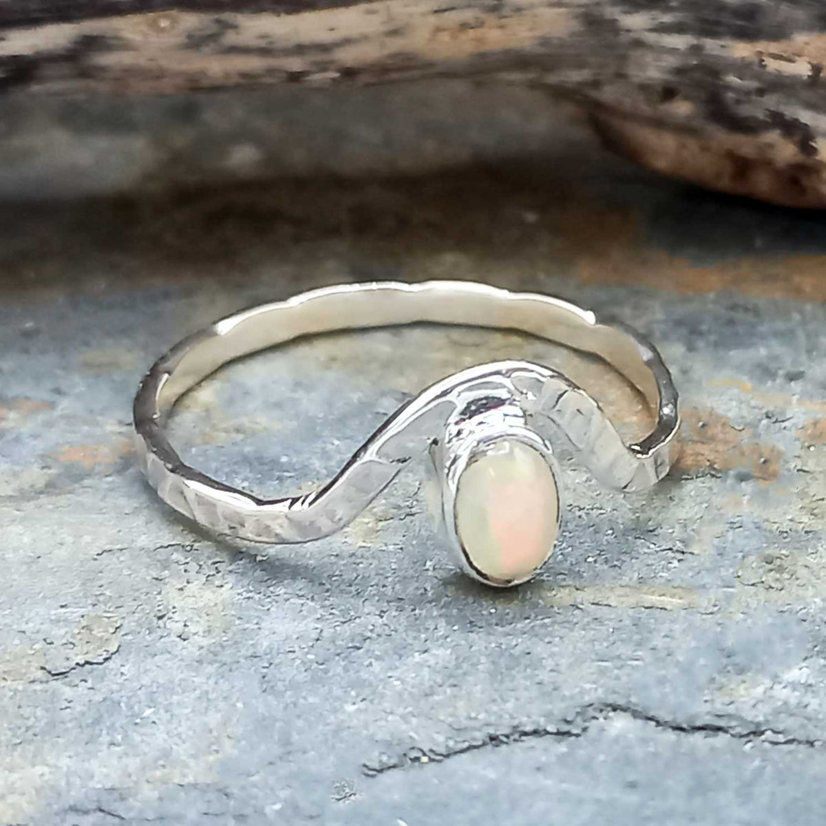 Thin hammered band with opal ring