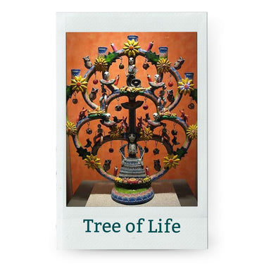 Decorative Mexican 'Tree of Life' sculpture with colorful elements on a Terracotta background