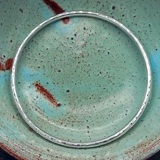 Hammered larger silver bangle