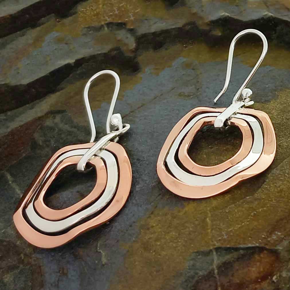 Handmade unusual silver copper drop earrings