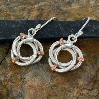 Enclosed copper silver drop earrings