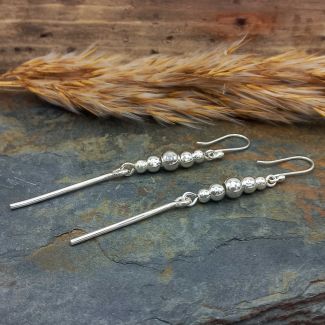 Handmade long silver ball earrings