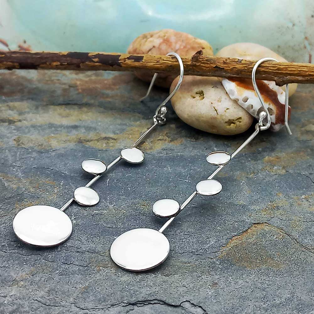 Long dangly unusual silver circle earrings Main image