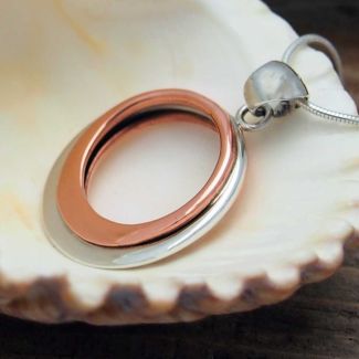 Unusual silver copper pendant