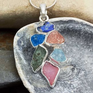 Unusual Silver Pendant with gemstones