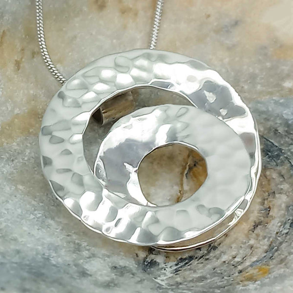 Handmade Mexican spiral silver pendant